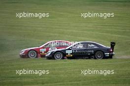 06.06.2004 Klettwitz, Germany,  DTM, Sunday, Stefan Mücke (GER), CLK AMG-Mercedes, Mercedes CLK-DTM (left) and Bernd Mayländer (GER), CLK AMG-Mercedes, Mercedes CLK-DTM (right), spinning off at the first corner - DTM Season 2004 at Lausitzring (Deutsche Tourenwagen Masters)