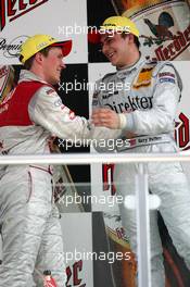 06.06.2004 Klettwitz, Germany,  DTM, Sunday, Gary Paffett (GBR), C-Klasse AMG-Mercedes, Portrait (1st, right), receiving congratulations from Mattias Ekström (SWE), Audi Sport Team Abt, Portrait (2nd, left) - DTM Season 2004 at Lausitzring (Deutsche Tourenwagen Masters)