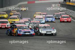 06.06.2004 Klettwitz, Germany,  DTM, Sunday, Start of the race with Christijan Albers (NED), DaimlerChrysler Bank AMG-Mercedes, AMG-Mercedes C-Klasse, staring from pole position but with Mattias Ekström (SWE), Audi Sport Team Abt, Audi A4 DTM, taking the lead in the first corner - DTM Season 2004 at Lausitzring (Deutsche Tourenwagen Masters)