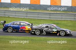 06.06.2004 Klettwitz, Germany,  DTM, Sunday, Gary Paffett (GBR), C-Klasse AMG-Mercedes, AMG-Mercedes C-Klasse, was lucky to get out of the pits just in front of Martin Tomczyk (GER), Audi Sport Team Abt, Audi A4 DTM - DTM Season 2004 at Lausitzring (Deutsche Tourenwagen Masters)