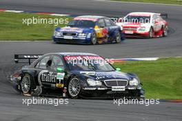 06.06.2004 Klettwitz, Germany,  DTM, Sunday, Gary Paffett (GBR), C-Klasse AMG-Mercedes, AMG-Mercedes C-Klasse, in front of Martin Tomczyk (GER), Audi Sport Team Abt, Audi A4 DTM and Timo Scheider (GER), OPC Team Holzer, Opel Vectra GTS V8 - DTM Season 2004 at Lausitzring (Deutsche Tourenwagen Masters)