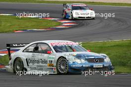 06.06.2004 Klettwitz, Germany,  DTM, Sunday, Markus Winkelhock (GER), Original-Teile AMG-Mercedes, Mercedes CLK-DTM, in front of Peter Dumbreck (GBR), OPC Team Phoenix, Opel Vectra GTS V8 - DTM Season 2004 at Lausitzring (Deutsche Tourenwagen Masters)