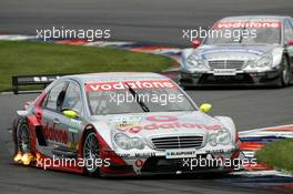 06.06.2004 Klettwitz, Germany,  DTM, Sunday, Bernd Schneider (GER), Vodafone AMG-Mercedes, AMG-Mercedes C-Klasse, in front of Christijan Albers (NED), DaimlerChrysler Bank AMG-Mercedes, AMG-Mercedes C-Klasse - DTM Season 2004 at Lausitzring (Deutsche Tourenwagen Masters)