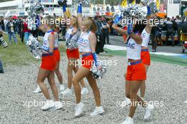 18.04.2004 Hockenheim, Germany,  DTM, Sunday, GMAC promotion girls warming up the crowd on the grandstand - DTM Season 2004 at Hockenheimring Baden-Württemberg (Deutsche Tourenwagen Masters, Deutschland)