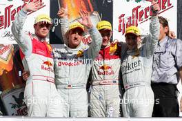 03.10.2004 Hockenheim, Germany,  DTM, Sunday, Podium, from left to right: Martin Tomczyk (GER), Audi Sport Team Abt, Portrait (2nd), Bernd Schneider (GER), Vodafone AMG-Mercedes, Portrait (1st), Mattias Ekström (SWE), Audi Sport Team Abt, Portrait (DTM Champion 2004), Gary Paffett (GBR), C-Klasse AMG-Mercedes, Portrait (3rd) and Hans-Jürgen Mattheis (GER), Team Manager HWA - DTM Season 2004 at Hockenheimring Baden-Württemberg (Deutsche Tourenwagen Masters)