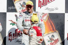 03.10.2004 Hockenheim, Germany,  DTM, Sunday, Podium, 2003 DTM Champion Bernd Schneider (GER), Vodafone AMG-Mercedes, congratulates the new 2004 DTM Champion Mattias Ekström (SWE), Audi Sport Team Abt - DTM Season 2004 at Hockenheimring Baden-Württemberg (Deutsche Tourenwagen Masters)