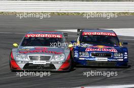 03.10.2004 Hockenheim, Germany,  DTM, Sunday, Bernd Schneider (GER), Vodafone AMG-Mercedes, AMG-Mercedes C-Klasse and Martin Tomczyk (GER), Audi Sport Team Abt, Audi A4 DTM, fighting for position - DTM Season 2004 at Hockenheimring Baden-Württemberg (Deutsche Tourenwagen Masters)