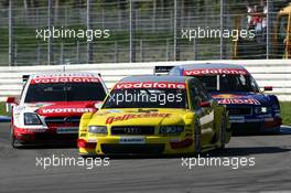 03.10.2004 Hockenheim, Germany,  DTM, Sunday, Christian Abt (GER), Audi Sport Team Abt Sportsline, Audi A4 DTM, in front of Timo Scheider (GER), OPC Team Holzer, Opel Vectra GTS V8 and Mattias Ekström (SWE), Audi Sport Team Abt, Audi A4 DTM - DTM Season 2004 at Hockenheimring Baden-Württemberg (Deutsche Tourenwagen Masters)