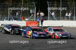 03.10.2004 Hockenheim, Germany,  DTM, Sunday, Bernd Schneider (GER), Vodafone AMG-Mercedes, AMG-Mercedes C-Klasse and Martin Tomczyk (GER), Audi Sport Team Abt, Audi A4 DTM, fighting for position - DTM Season 2004 at Hockenheimring Baden-Württemberg (Deutsche Tourenwagen Masters)