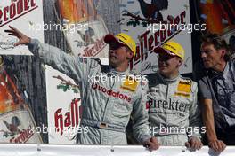 03.10.2004 Hockenheim, Germany,  DTM, Sunday, Podium, Bernd Schneider (GER), Vodafone AMG-Mercedes, AMG-Mercedes C-Klasse, Mattias Ekström (SWE), Audi Sport Team Abt, Audi A4 DTM, Gary Paffett (GBR), C-Klasse AMG-Mercedes, AMG-Mercedes C-Klasse, Hans-Juergen Mattheis (GER), Team Manager HWA - DTM Season 2004 at Hockenheimring Baden-Württemberg (Deutsche Tourenwagen Masters, Deutschland)