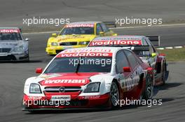 01.08.2004 Nürburg, Germany,  DTM, Sunday, Timo Scheider (GER), OPC Team Holzer, Opel Vectra GTS V8, in front of Bernd Schneider (GER), Vodafone AMG-Mercedes, AMG-Mercedes C-Klasse, Jean Alesi (FRA), AMG-Mercedes, AMG-Mercedes C-Klasse and Tom Kristensen (DNK), Audi Sport Team Abt Sportsline, Audi A4 DTM - DTM Season 2004 at Nürburgring (Deutsche Tourenwagen Masters)