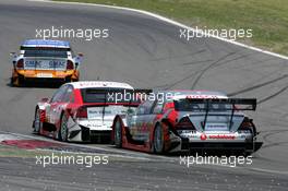 01.08.2004 Nürburg, Germany,  DTM, Sunday, Bernd Schneider (GER), Vodafone AMG-Mercedes, AMG-Mercedes C-Klasse, behind Timo Scheider (GER), OPC Team Holzer, Opel Vectra GTS V8 and Marcel Fässler (SUI), OPC Team Phoenix, Opel Vectra GTS V8 - DTM Season 2004 at Nürburgring (Deutsche Tourenwagen Masters)