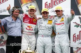 01.08.2004 Nürburg, Germany,  DTM, Sunday, Podium, Gary Paffett (GBR), C-Klasse AMG-Mercedes, Portrait (1sy, center), Mattias Ekström (SWE), Audi Sport Team Abt, Portrait (2nd, left), Bernd Schneider (GER), Vodafone AMG-Mercedes, Portrait (3rd, right) and Gerhard Ungar (GER), Chief Designer AMG (far left) - DTM Season 2004 at Nürburgring (Deutsche Tourenwagen Masters)