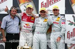 01.08.2004 Nürburg, Germany,  DTM, Sunday, Podium, Gary Paffett (GBR), C-Klasse AMG-Mercedes, Portrait (1st, center), Mattias Ekström (SWE), Audi Sport Team Abt, Portrait (2nd, left), Bernd Schneider (GER), Vodafone AMG-Mercedes, Portrait (3rd, right) and Gerhard Ungar (GER), Chief Designer AMG - DTM Season 2004 at Nürburgring (Deutsche Tourenwagen Masters)