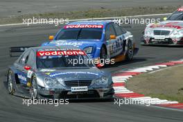 01.08.2004 Nürburg, Germany,  DTM, Sunday, Christijan Albers (NED), DaimlerChrysler Bank AMG-Mercedes, AMG-Mercedes C-Klasse, in front of Marcel Fässler (SUI), OPC Team Phoenix, Opel Vectra GTS V8 and Bernd Schneider (GER), Vodafone AMG-Mercedes, AMG-Mercedes C-Klasse - DTM Season 2004 at Nürburgring (Deutsche Tourenwagen Masters)