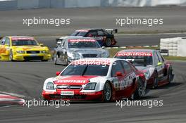 01.08.2004 Nürburg, Germany,  DTM, Sunday, Timo Scheider (GER), OPC Team Holzer, Opel Vectra GTS V8, in front of Bernd Schneider (GER), Vodafone AMG-Mercedes, AMG-Mercedes C-Klasse, Jean Alesi (FRA), AMG-Mercedes, AMG-Mercedes C-Klasse, Tom Kristensen (DNK), Audi Sport Team Abt Sportsline, Audi A4 DTM and Peter Dumbreck (GBR), OPC Team Phoenix, Opel Vectra GTS V8 - DTM Season 2004 at Nürburgring (Deutsche Tourenwagen Masters)