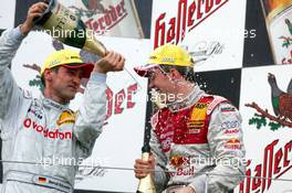 01.08.2004 Nürburg, Germany,  DTM, Sunday, Podium, Bernd Schneider (GER), Vodafone AMG-Mercedes, Portrait (3rd, left), giving Mattias Ekström (SWE), Audi Sport Team Abt, Portrait (2nd, right), a champaign shower - DTM Season 2004 at Nürburgring (Deutsche Tourenwagen Masters)