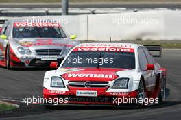 01.08.2004 Nürburg, Germany,  DTM, Sunday, Timo Scheider (GER), OPC Team Holzer, Opel Vectra GTS V8, in front of Bernd Schneider (GER), Vodafone AMG-Mercedes, AMG-Mercedes C-Klasse - DTM Season 2004 at Nürburgring (Deutsche Tourenwagen Masters)