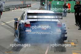 25.06.2004 Nürnberg, Germany,  DTM, Friday, Mattias Ekström (SWE), Audi Sport Team Abt, Audi A4 DTM, leaving the pits with a lof of wheelspin after a pitstop practice - DTM Season 2004 at Norisring (Deutsche Tourenwagen Masters)