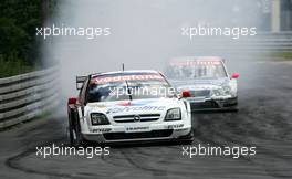 25.06.2004 Nürnberg, Germany,  DTM, Friday, Peter Dumbreck (GBR), OPC Team Phoenix, Opel Vectra GTS V8, locking up under breaking - DTM Season 2004 at Norisring (Deutsche Tourenwagen Masters)