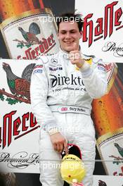 27.06.2004 Nürnberg, Germany,  DTM, Sunday, Podium, Gary Paffett (GBR), C-Klasse AMG-Mercedes, Portrait (1st) - DTM Season 2004 at Norisring (Deutsche Tourenwagen Masters)