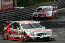 27.06.2004 Nürnberg, Germany,  DTM, Sunday, Bernd Schneider (GER), Vodafone AMG-Mercedes, AMG-Mercedes C-Klasse, in front of Timo Scheider (GER), OPC Team Holzer, Opel Vectra GTS V8 - DTM Season 2004 at Norisring (Deutsche Tourenwagen Masters)