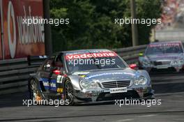 27.06.2004 Nürnberg, Germany,  DTM, Sunday, Christijan Albers (NED), DaimlerChrysler Bank AMG-Mercedes, AMG-Mercedes C-Klasse, in front of Bernd Schneider (GER), Vodafone AMG-Mercedes, AMG-Mercedes C-Klasse - DTM Season 2004 at Norisring (Deutsche Tourenwagen Masters)