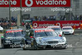 27.06.2004 Nürnberg, Germany,  DTM, Sunday, Christijan Albers (NED), DaimlerChrysler Bank AMG-Mercedes, AMG-Mercedes C-Klasse, leading the race for Gary Paffett (GBR), C-Klasse AMG-Mercedes, AMG-Mercedes C-Klasse, Jean Alesi (FRA), AMG-Mercedes, AMG-Mercedes C-Klasse and Bernd Schneider (GER), Vodafone AMG-Mercedes, AMG-Mercedes C-Klasse - DTM Season 2004 at Norisring (Deutsche Tourenwagen Masters)