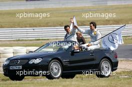 08.08.2004 Oschersleben, Germany,  DTM, Sunday, Driver parade with Jean Alesi (FRA), AMG-Mercedes, and Gary Paffett (GBR), C-Klasse AMG-Mercedes - DTM Season 2004 at Motopark Oschersleben (Deutsche Tourenwagen Masters)