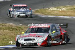 08.08.2004 Oschersleben, Germany,  DTM, Sunday, Bernd Schneider (GER), Vodafone AMG-Mercedes, AMG-Mercedes C-Klasse, in front of Christijan Albers (NED), DaimlerChrysler Bank AMG-Mercedes, AMG-Mercedes C-Klasse - DTM Season 2004 at Motopark Oschersleben (Deutsche Tourenwagen Masters)