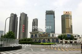 15.07.2004 Shanghai, China,  DTM, Thursday, Old style fish restaurant next to the track, with in the background large new buildings which start to dominate the skyline - DTM Season 2004 at Pu Dong Street Circuit Shanghai (Deutsche Tourenwagen Masters)