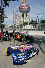 17.07.2004 Shanghai, China,  DTM, Saturday, The car of Martin Tomczyk (GER), Audi Sport Team Abt, Audi A4 DTM, in the temporary pitlane. In the background the 468-meter high Oriental Pearl TV tower - DTM Season 2004 at Pu Dong Street Circuit Shanghai (Deutsche Tourenwagen Masters)