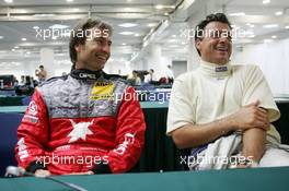 17.07.2004 Shanghai, China,  DTM, Saturday, Heinz-Harald Frentzen (GER), OPC Team Holzer, Portrait (left) and Jean Alesi (FRA), AMG-Mercedes, Portrait (right), having some fun before the Post-Qualifying press conference - DTM Season 2004 at Pu Dong Street Circuit Shanghai (Deutsche Tourenwagen Masters)