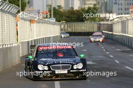 18.07.2004 Shanghai, China,  DTM, Sunday, Gary Paffett (GBR), C-Klasse AMG-Mercedes, AMG-Mercedes C-Klasse, leading the race - DTM Season 2004 at Pu Dong Street Circuit Shanghai (Deutsche Tourenwagen Masters)