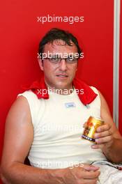 18.07.2004 Shanghai, China,  DTM, Sunday, Christian Abt (GER), Audi Sport Team Abt Sportsline, Portrait, with a can of Chinese Red Bull - DTM Season 2004 at Pu Dong Street Circuit Shanghai (Deutsche Tourenwagen Masters)