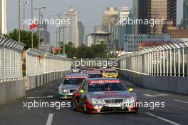 18.07.2004 Shanghai, China,  DTM, Sunday, Bernd Schneider (GER), Vodafone AMG-Mercedes, AMG-Mercedes C-Klasse, managed to hold on to 2nd place despite the problems in the first corner - DTM Season 2004 at Pu Dong Street Circuit Shanghai (Deutsche Tourenwagen Masters)