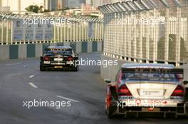 18.07.2004 Shanghai, China,  DTM, Sunday, Gary Paffett (GBR), C-Klasse AMG-Mercedes, AMG-Mercedes C-Klasse, leading for Bernd Schneider (GER), Vodafone AMG-Mercedes, AMG-Mercedes C-Klasse - DTM Season 2004 at Pu Dong Street Circuit Shanghai (Deutsche Tourenwagen Masters)