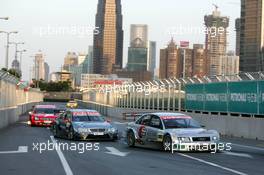 18.07.2004 Shanghai, China,  DTM, Sunday, Rinaldo Capello (ITA), Audi Sport Infineon Team Joest, Audi A4 DTM, in front of Christijan Albers (NED), DaimlerChrysler Bank AMG-Mercedes, AMG-Mercedes C-Klasse and Heinz-Harald Frentzen (GER), OPC Team Holzer, Opel Vectra GTS V8 - DTM Season 2004 at Pu Dong Street Circuit Shanghai (Deutsche Tourenwagen Masters)