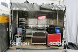 15.07.2004 Shanghai, China,  DTM, Thursday, A Lufthansa cargo box which is used as a temporary work area for Audi's gearbox technician Rainer. The sign says "Rainers Getriebe Filiale Shanghai", in both German and Chinese - DTM Season 2004 at Pu Dong Street Circuit Shanghai (Deutsche Tourenwagen Masters)