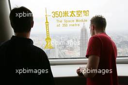 15.07.2004 Shanghai, China,  DTM, Thursday, DTM drivers Jeroen Bleekemolen (NED), OPC Euroteam, Portrait (left) and Stefan Mücke (GER), CLK AMG-Mercedes, Portrait enjoy the view from the 350-meter high viewing point on the 468-meter high Oriental Pearl TV tower - DTM Season 2004 at Pu Dong Street Circuit Shanghai (Deutsche Tourenwagen Masters)