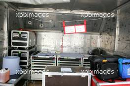 15.07.2004 Shanghai, China,  DTM, Thursday, A Lufthansa cargo box which is used as a temporary work area for Audi's gearbox technician Rainer. The sign says "Rainers Getriebe Filiale Shanghai", in both German and Chinese - DTM Season 2004 at Pu Dong Street Circuit Shanghai (Deutsche Tourenwagen Masters)