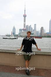 15.07.2004 Shanghai, China,  DTM, Thursday, Jeroen Bleekemolen (NED), OPC Euroteam, Portrait, in front of the Huangpu river. In the background the 468-meter high Oriental Pearl TV tower - DTM Season 2004 at Pu Dong Street Circuit Shanghai (Deutsche Tourenwagen Masters)