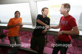 15.07.2004 Shanghai, China,  DTM, Thursday, DTM drivers Jeroen Bleekemolen (NED), OPC Euroteam, Portrait (center) and Stefan Mücke (GER), CLK AMG-Mercedes, Portrait (right), meet each other at the 350-meter high viewing point of the 468-meter high Oriental Pearl TV tower. Left: Markus Winkelhock (GER), Original-Teile AMG-Mercedes, Portrait - DTM Season 2004 at Pu Dong Street Circuit Shanghai (Deutsche Tourenwagen Masters)