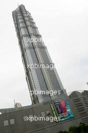 15.07.2004 Shanghai, China,  DTM, Thursday, The 421-meter high Hyatt Hotel with a large advertising sign of the DTM race - DTM Season 2004 at Pu Dong Street Circuit Shanghai (Deutsche Tourenwagen Masters)