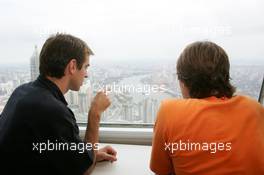 15.07.2004 Shanghai, China,  DTM, Thursday, DTM drivers Jeroen Bleekemolen (NED), OPC Euroteam, Portrait (left) and Markus Winkelhock (GER), Original-Teile AMG-Mercedes, Portrait (right) enjoy the view from the 350-meter high viewing point on the 468-meter high Oriental Pearl TV tower - DTM Season 2004 at Pu Dong Street Circuit Shanghai (Deutsche Tourenwagen Masters)