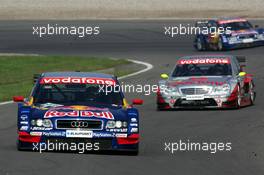 05.09.2004 Zandvoort, The Netherlands,  DTM, Sunday, Mattias Ekström (SWE), Audi Sport Team Abt, Audi A4 DTM, leading the race in front of Bernd Schneider (GER), Vodafone AMG-Mercedes, AMG-Mercedes C-Klasse and Martin Tomczyk (GER), Audi Sport Team Abt, Audi A4 DTM - DTM Season 2004 at Circuit Park Zandvoort (Deutsche Tourenwagen Masters)