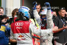 05.09.2004 Zandvoort, The Netherlands,  DTM, Sunday, Mattias Ekström (SWE), Audi Sport Team Abt, Portrait (1st, right), steps out of his car, while Martin Tomczyk (GER), Audi Sport Team Abt, Portrait (2nd, left), congratulates him - DTM Season 2004 at Circuit Park Zandvoort (Deutsche Tourenwagen Masters)