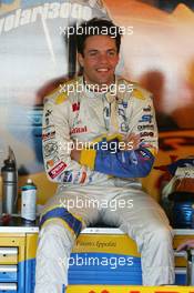 11.09.2004 Dijon, France, Saturday 11 September 2004, Fausto Ippoliti, ITA, Draco Racing Jr. team, portrait, sitting in the pitbox waiting for the start of the qualifying session - SUPERFUND EURO 3000 Championship Rd 7, Circuit Dijon-Prenois, France, FRA - SUPERFUND COPYRIGHT FREE editorial use only
