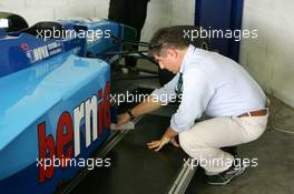 11.09.2004 Dijon, France, Saturday 11 September 2004, Fabrizio Nosco, ITA, Technical Delegate, checking the ride height of the cars during technical scruteneering - SUPERFUND EURO 3000 Championship Rd 7, Circuit Dijon-Prenois, France, FRA - SUPERFUND COPYRIGHT FREE editorial use only