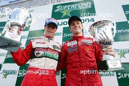 12.09.2004 Dijon, France, Sunday 12 September 2004, Podium, A 1-2 victory for John Village Automotive, with Alex Lloyd, GBR, John Village Automotive, portrait (1st. left), and Jonathan Reid, NZL, John Village Automotive, portrait (2nd, right) - SUPERFUND EURO 3000 Championship Rd 7, Circuit Dijon-Prenois, France, FRA - SUPERFUND COPYRIGHT FREE editorial use only